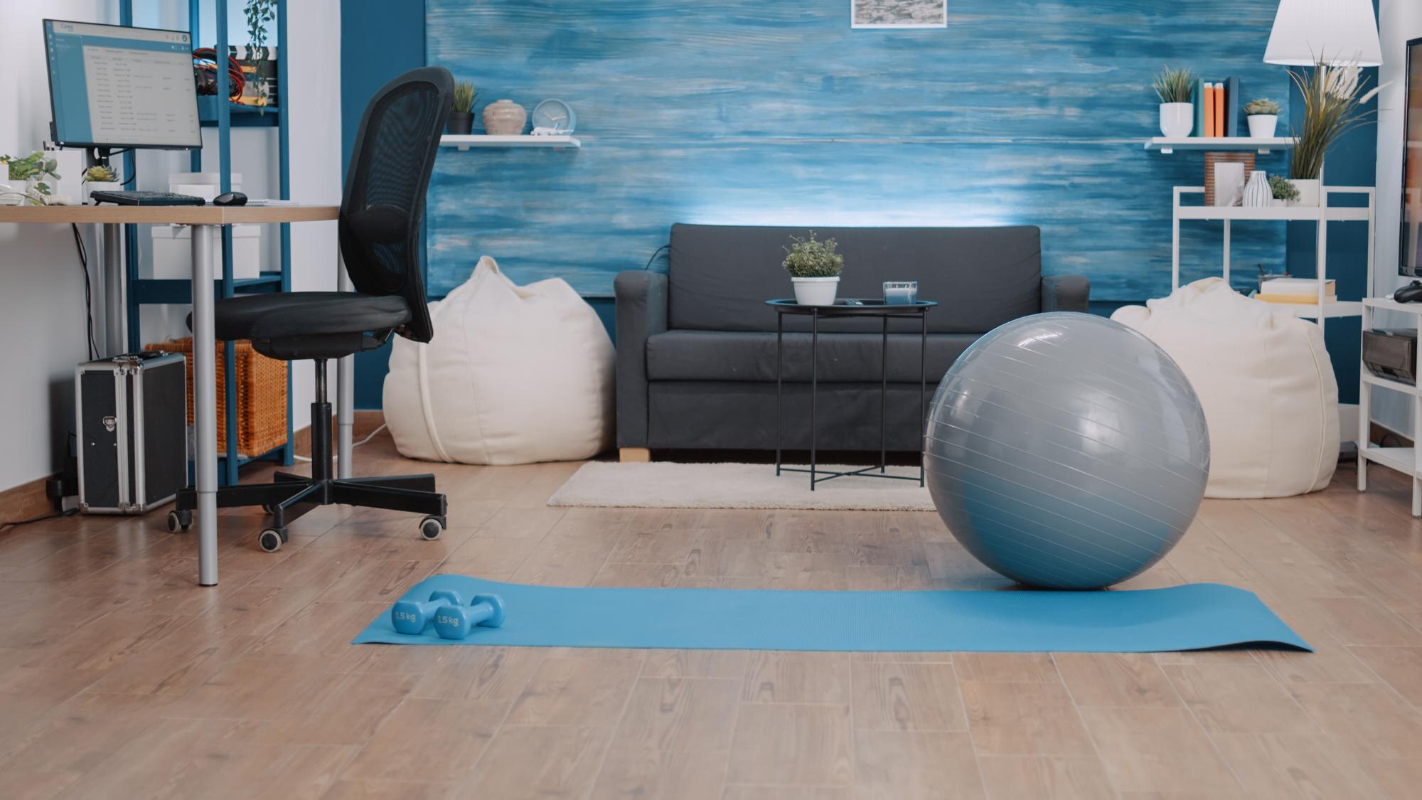 empty-space-with-training-equipment-workout-home-nobody-living-room-with-floor-mat-dumbbells-toning-ball-physical-exercise-practice-sport-fitness-gymnastics_482257-27520